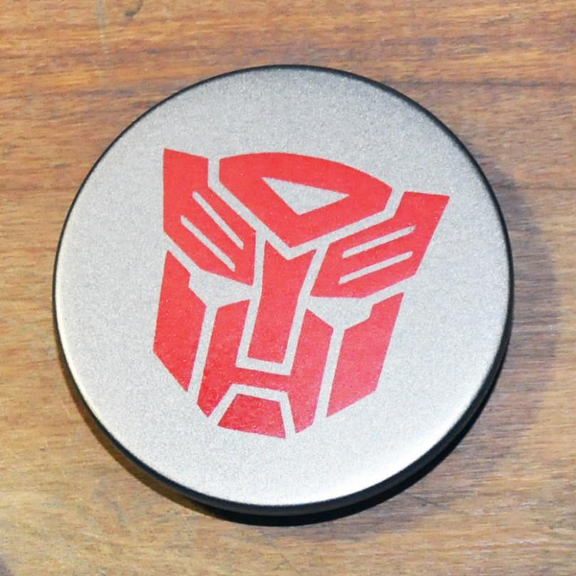 Изготовленный колпачок с лого Трансформеров