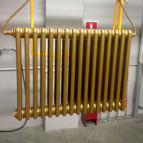Порошковая покраска батарей отопления в золотой металлик.