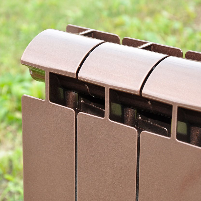 Фрагмент батареи отопления цвета бронзовый металлик