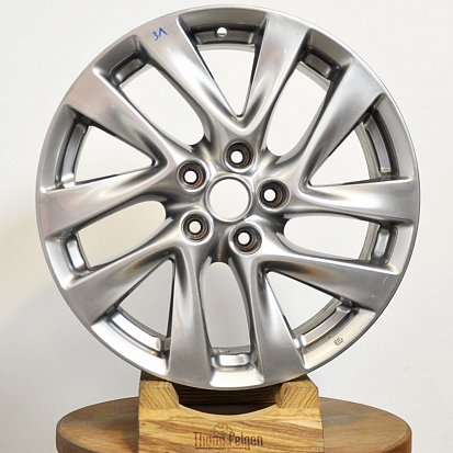Порошковая покраска дисков Nissan R18 от Nissan в чёрный глянец
