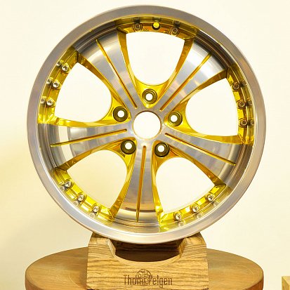 Зеркальная полировка дисков R17 от Audi и покраска в фирменный жёлтый Candy