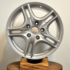 Покраска порошковая дисков от Porsche Cayenne в серебристый металлик.