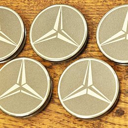 Изготовление и покраска колпачков для дисков Mercedes в тёмно-серый с серебристым логотипом