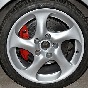 Покраска дисков для Porsche Carrera 4S в серый металлик.