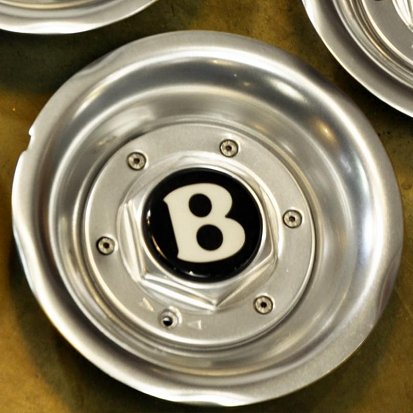 Изготовление и полировка с покраской колпачков для Bentley