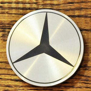 Изготовление колпачков и нанесение логотипа Mercedes