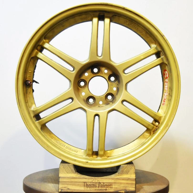Покраска дисков RAYS R18 от Subaru Legacy в золотой мат