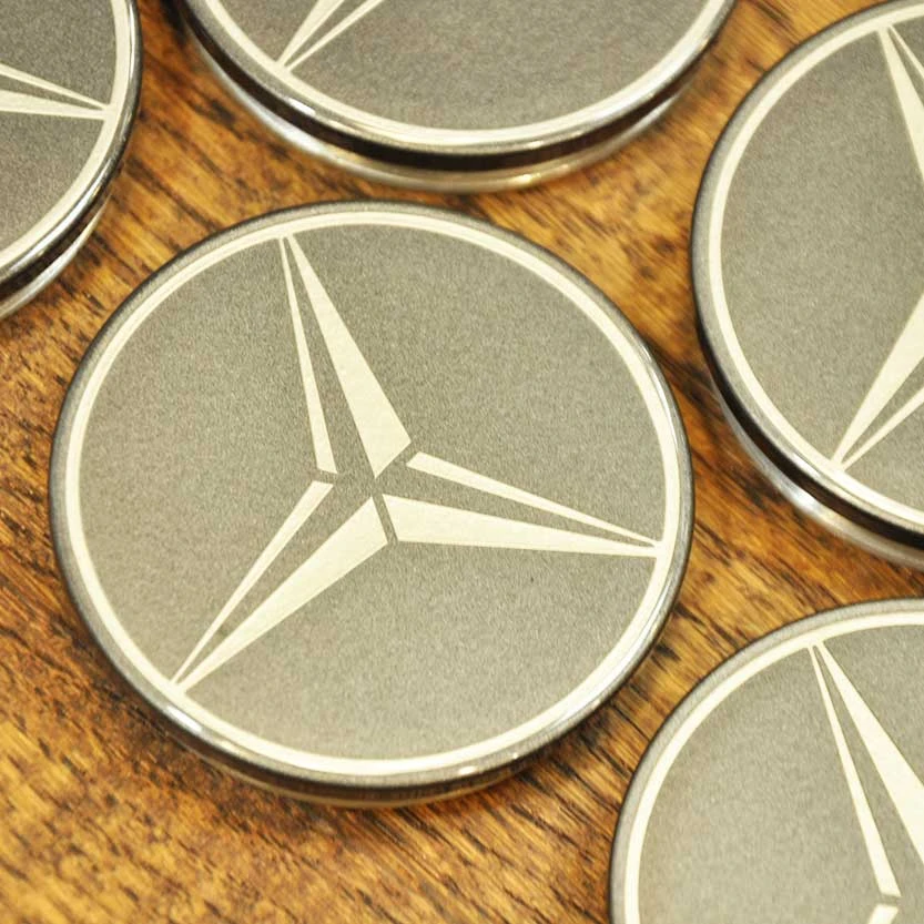 Изготовление и покраска колпачков для дисков Mercedes в тёмно-серый с серебристым логотипом