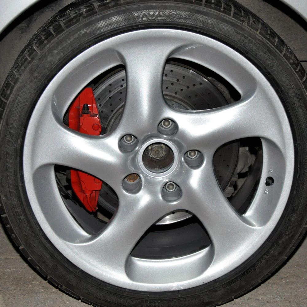 Покраска дисков для Porsche Carrera 4S в серый металлик.