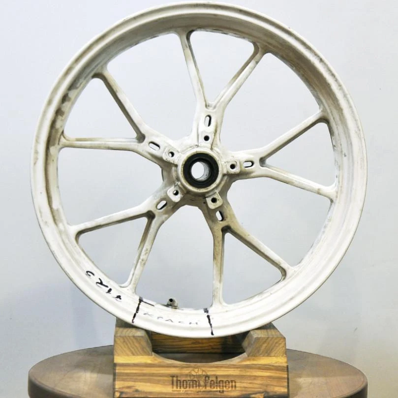 Покраска мотодисков Enkei R17 от Honda в чёрный и красный