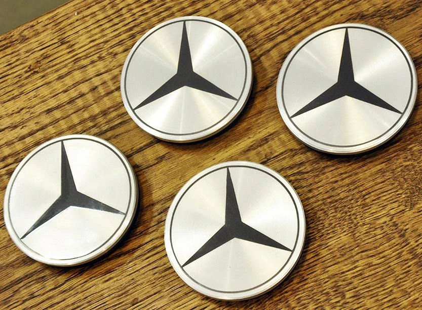 Изготовление колпачков и нанесение логотипа Mercedes